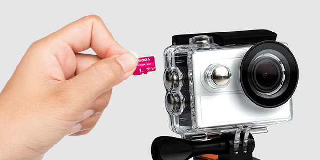 Inserting EXCERIA PLUS G3 microSD card into a camera